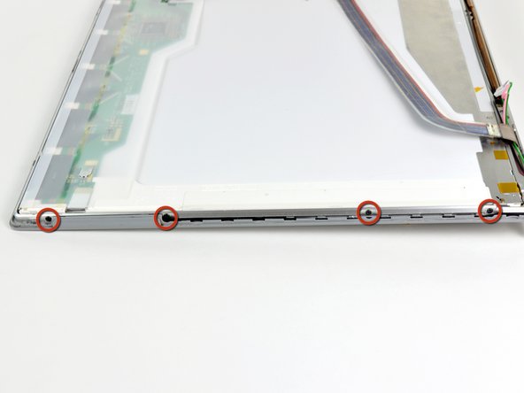 PowerBook G4 Aluminum 17" 1.67 GHz (High-Res) Front Display Bezel Replacement: step 48, image 1 of 1