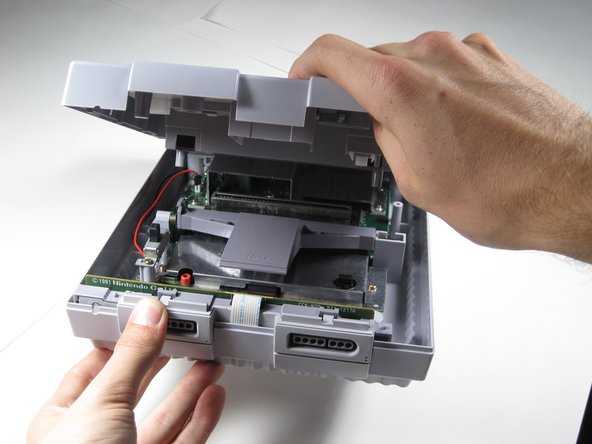 Super Nintendo Super Nintendo Outer Case Replacement: step 2, image 2 of 3