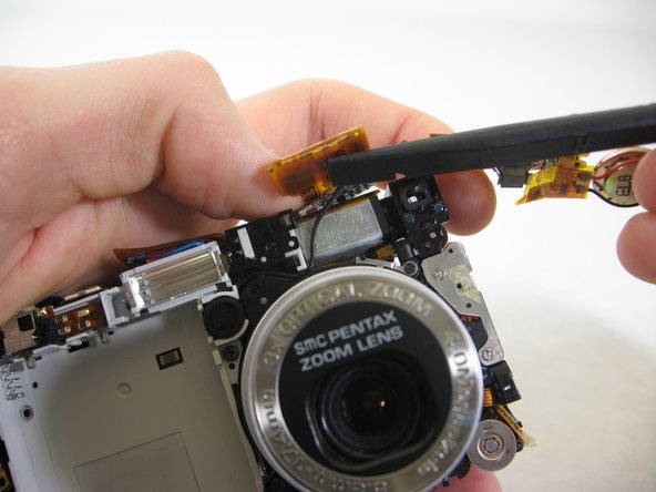 Disassembling Pentax Optio S4i Lens Assembly: step 22, image 2 of 2