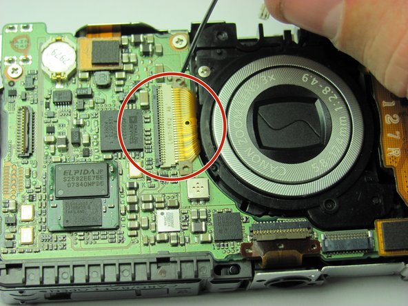 Canon Powershot SD750 Motherboard Replacement: step 16, image 1 of 2