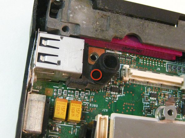 Disassembling IBM ThinkPad T42 Lower Bracket: step 7, image 1 of 1