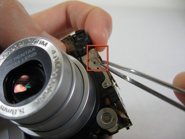 Disassembling Pentax Optio S4i Lens Assembly: step 21, image 1 of 2