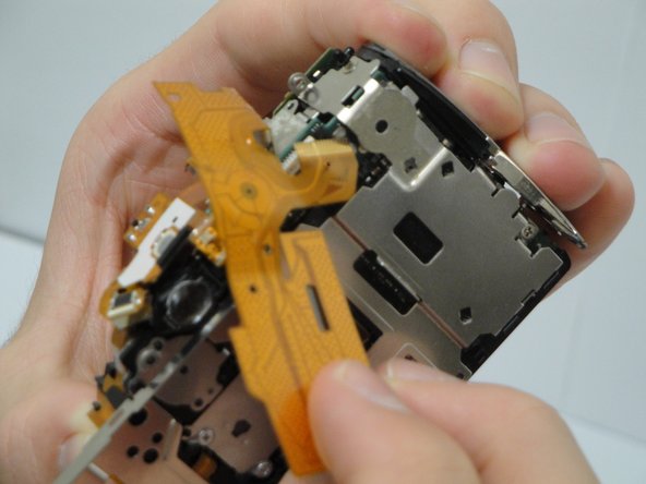 Disassembling Canon PowerShot SD800 IS Lens Assembly: step 23, image 1 of 1