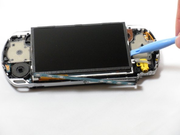 PSP 2000  Memory Stick Slot Replacement: step 7, image 1 of 3