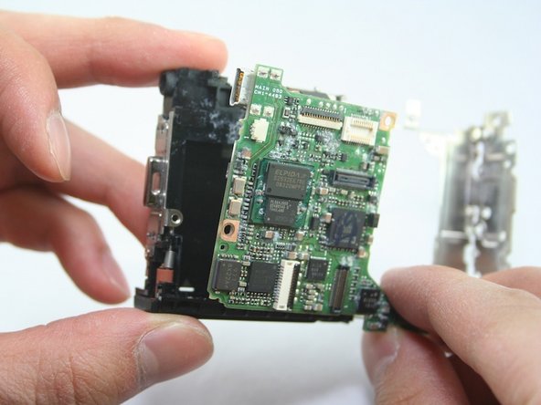 Disassembling Canon PowerShot SD1100 IS AV port and Logic board: step 25, image 1 of 2