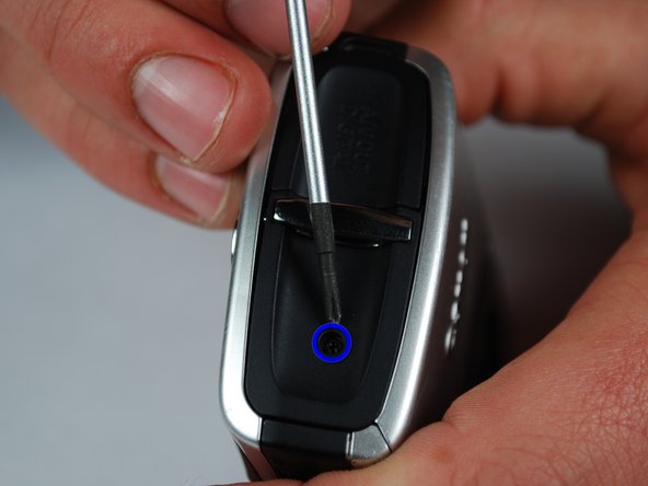 Canon PowerShot SD870 IS Card and Battery Slot Replacement: step 2, image 2 of 3