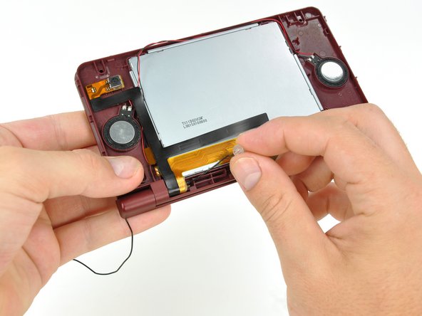 Nintendo DSi XL Front Bezel Replacement: step 32, image 2 of 3