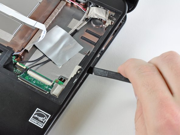 HP Mini 1000 Left Display Hinge Replacement: step 14, image 2 of 2