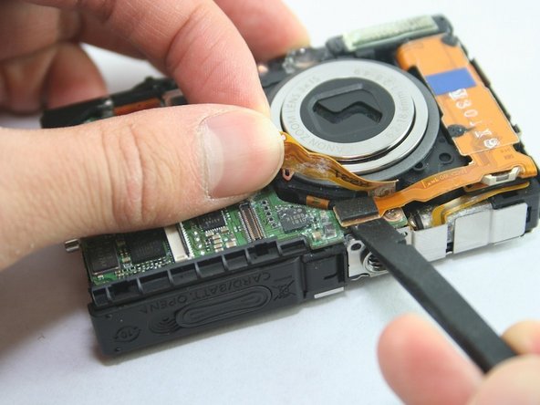 Disassembling Canon PowerShot SD1100 IS AV port and Logic board: step 13, image 2 of 2