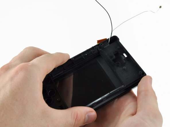 Nintendo DS Lite Front Display Bezel Replacement: step 19, image 1 of 2