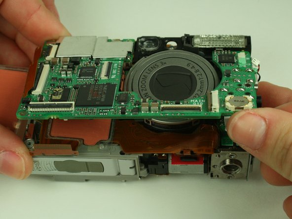 Canon PowerShot S400 Battery Replacement: step 15, image 1 of 3