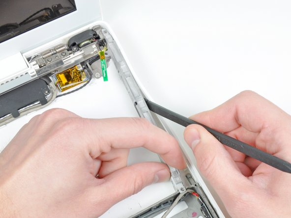 MacBook Core 2 Duo Optical Drive Bezel Replacement: step 27, image 2 of 2