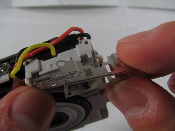 Removing Olympus FE-210 Flash Assembly: step 8, image 1 of 2