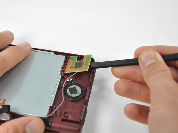 Nintendo DSi XL Speakers Replacement: step 10, image 1 of 1