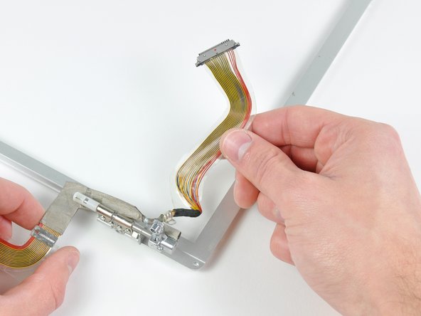 PowerBook G4 Aluminum 15" 1.67 GHz Front Display Bezel Replacement: step 38, image 2 of 2