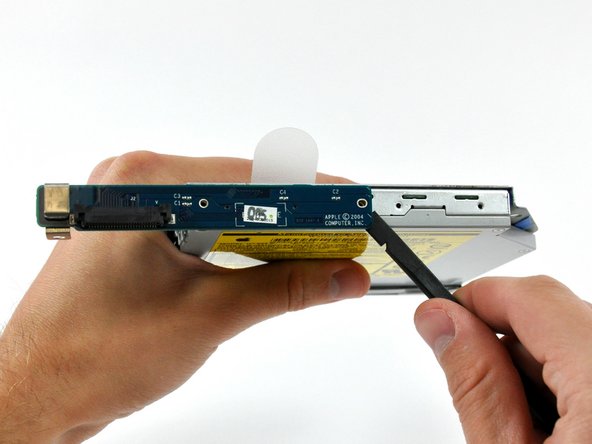 iMac G5 20" Model A1076 Optical Drive Replacement: step 6, image 1 of 2