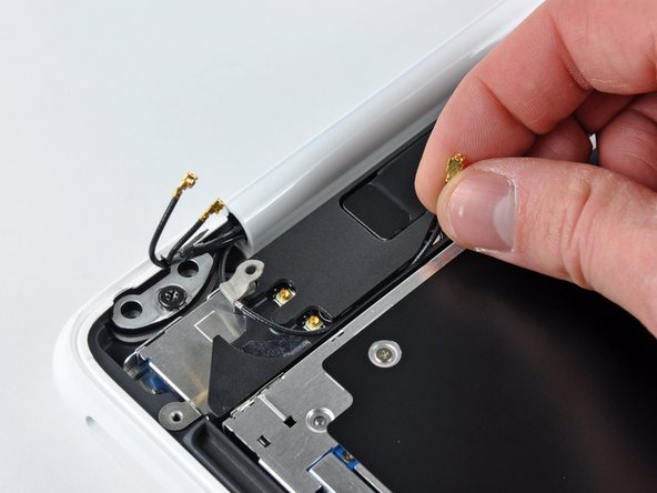 MacBook Unibody Model A1342 Rear Display Bezel Replacement: step 8, image 2 of 2