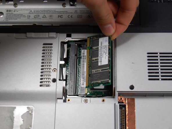 HP Pavilion dv1000 Back Cover Replacement: step 12, image 1 of 1