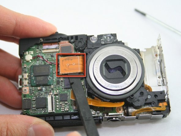 Disassembling Canon PowerShot SD1100 IS AV port and Logic board: step 17, image 1 of 2