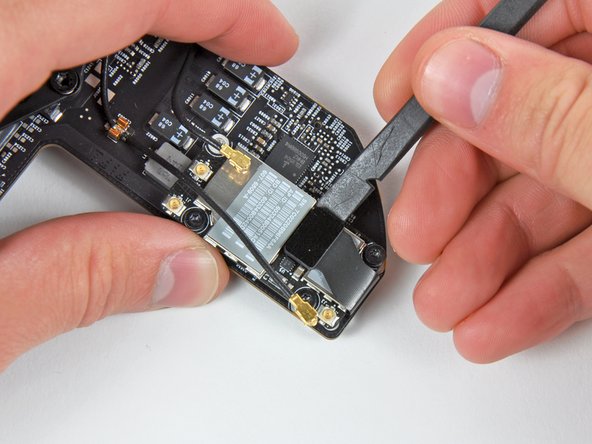 Mac Mini Mid 2010 AirPort/Bluetooth Board Replacement: step 24, image 1 of 1