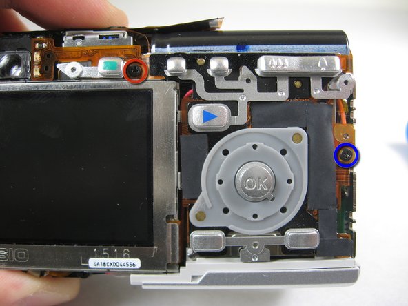 Disassembling Pentax Optio S4i Lens Assembly: step 7, image 2 of 2