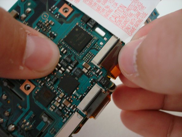 Sony Cyber-shot DSC-W5 Lens Replacement: step 15, image 2 of 3