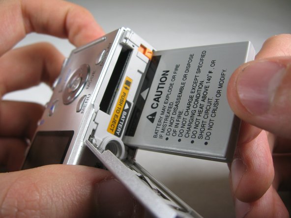 Pentax Optio S4i Battery Replacement: step 3, image 1 of 2