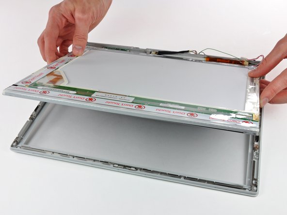 iBook G3 14" Front Display Bezel Replacement: step 57, image 1 of 1