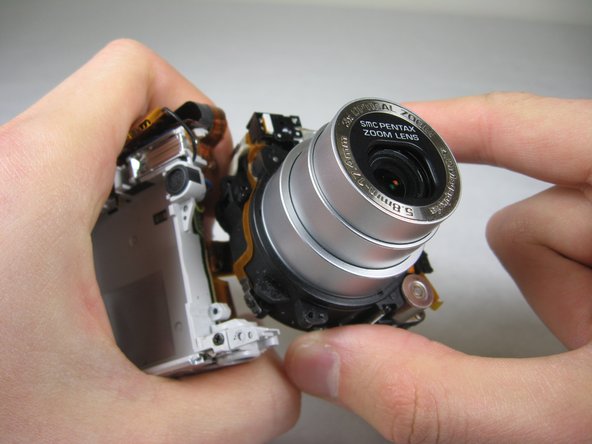 Disassembling Pentax Optio S4i Lens Assembly: step 30, image 3 of 3