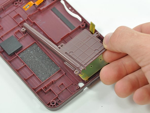 Nintendo DSi XL Stylus Housing Replacement: step 10, image 3 of 3