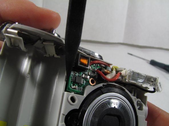 Removing Olympus FE-210 Flash Assembly: step 10, image 1 of 3