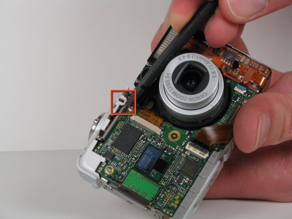 Canon PowerShot SD200 Buttons Replacement: step 9, image 1 of 2
