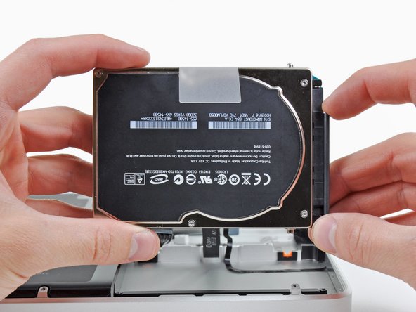 MacBook Pro 17" Unibody Upper Case Replacement: step 29, image 1 of 2