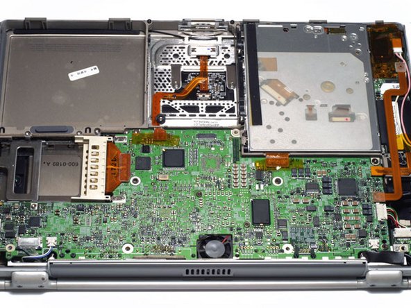 PowerBook G4 Titanium DVI PC Card Cage Replacement: step 11, image 1 of 1