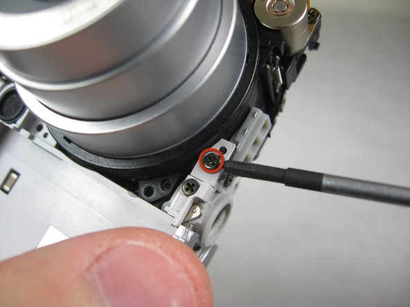 Disassembling Pentax Optio S4i Lens Assembly: step 26, image 3 of 3