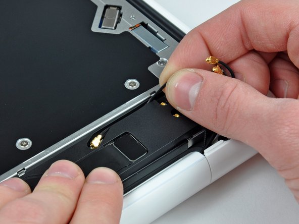 MacBook Unibody Model A1342 Rear Speaker Replacement: step 10, image 2 of 2
