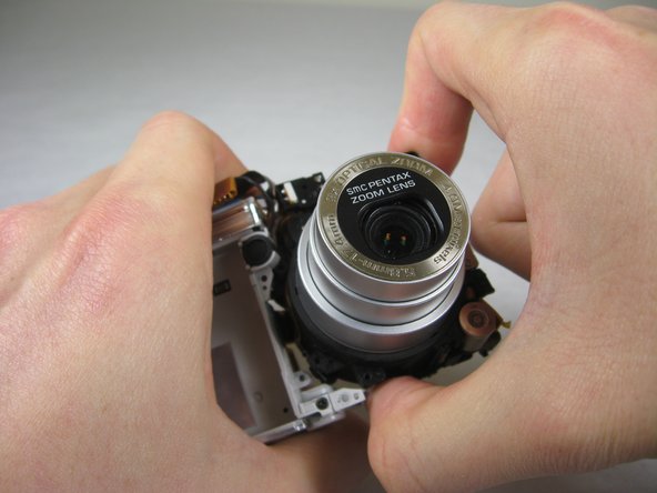 Disassembling Pentax Optio S4i Lens Assembly: step 30, image 2 of 3