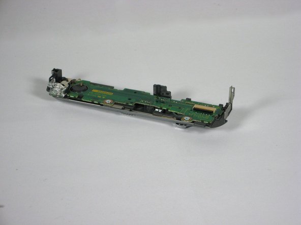 Panasonic Lumix DMC-TZ5 Button Board Replacement: step 11, image 2 of 3