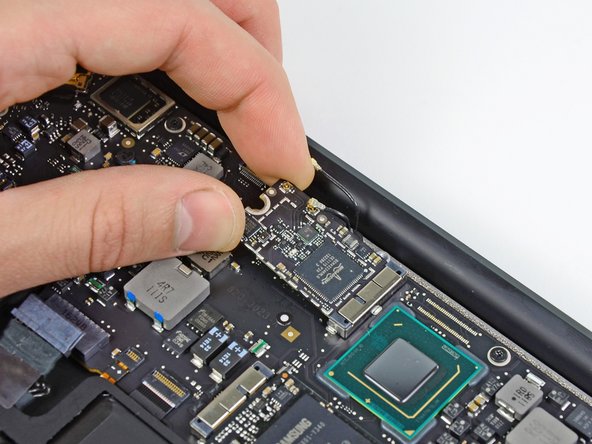 MacBook Air 13" Mid 2011 AirPort/Bluetooth Card Replacement: step 6, image 1 of 2