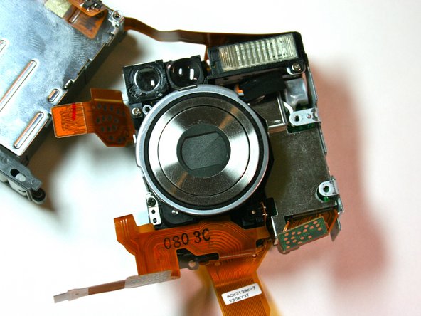 Canon Powershot S200 Camera lens Replacement: step 25, image 2 of 2