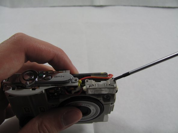 Removing Olympus FE-210 Flash Assembly: step 7, image 2 of 2