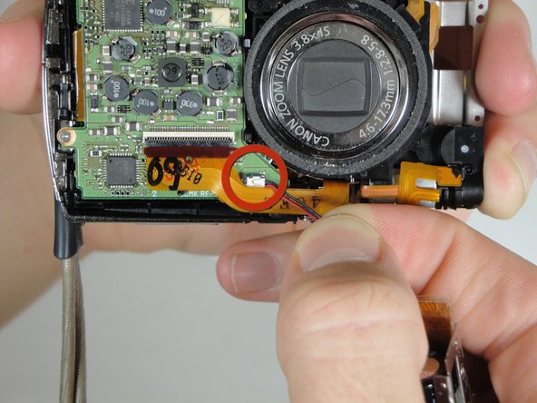 Disassembling Canon PowerShot SD800 IS Lens Assembly: step 14, image 1 of 1