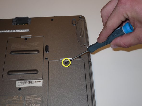 Removing the Dell Inspiron 1150 Modem Card: step 2, image 2 of 3