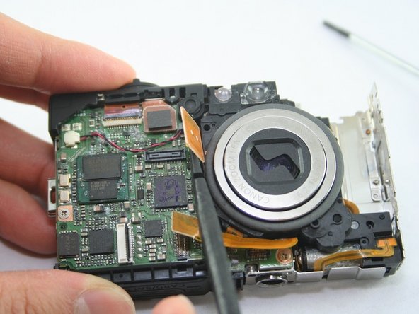 Disassembling Canon PowerShot SD1100 IS AV port and Logic board: step 17, image 2 of 2