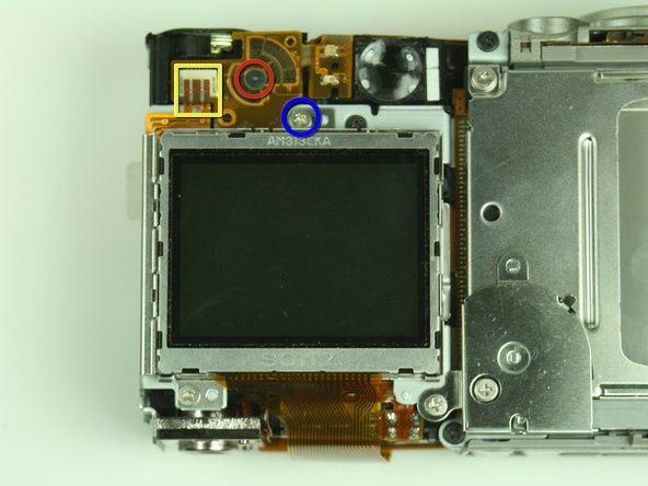 Canon PowerShot S400 Battery Replacement: step 7, image 1 of 2