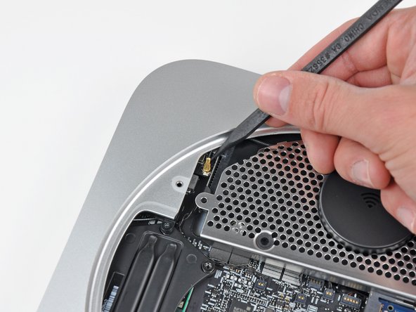 Mac Mini Mid 2010 I/O Bezel Replacement: step 10, image 1 of 1