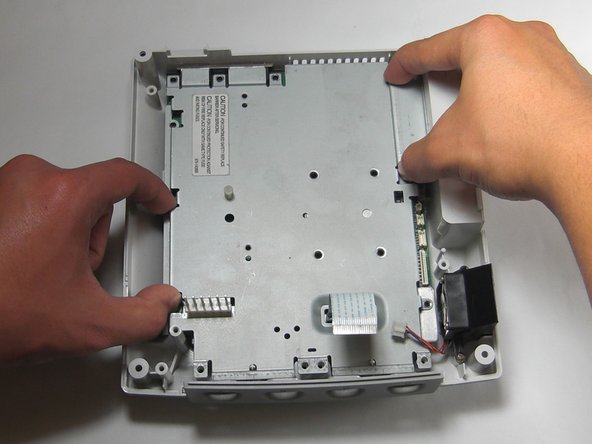 Sega Dreamcast Logic Board Removal: step 21, image 1 of 3