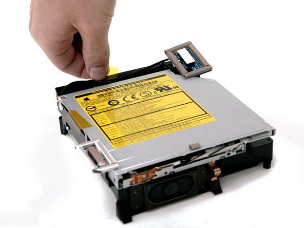 Mac mini (PowerPC) AirPort Antenna Replacement: step 10, image 1 of 1