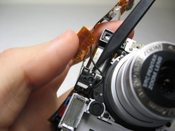 Disassembling Pentax Optio S4i Lens Assembly: step 23, image 2 of 3