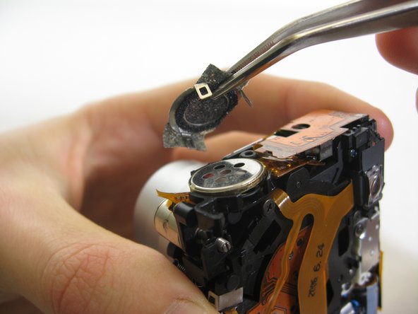 Disassembling Pentax Optio S4i Lens Assembly: step 20, image 1 of 1